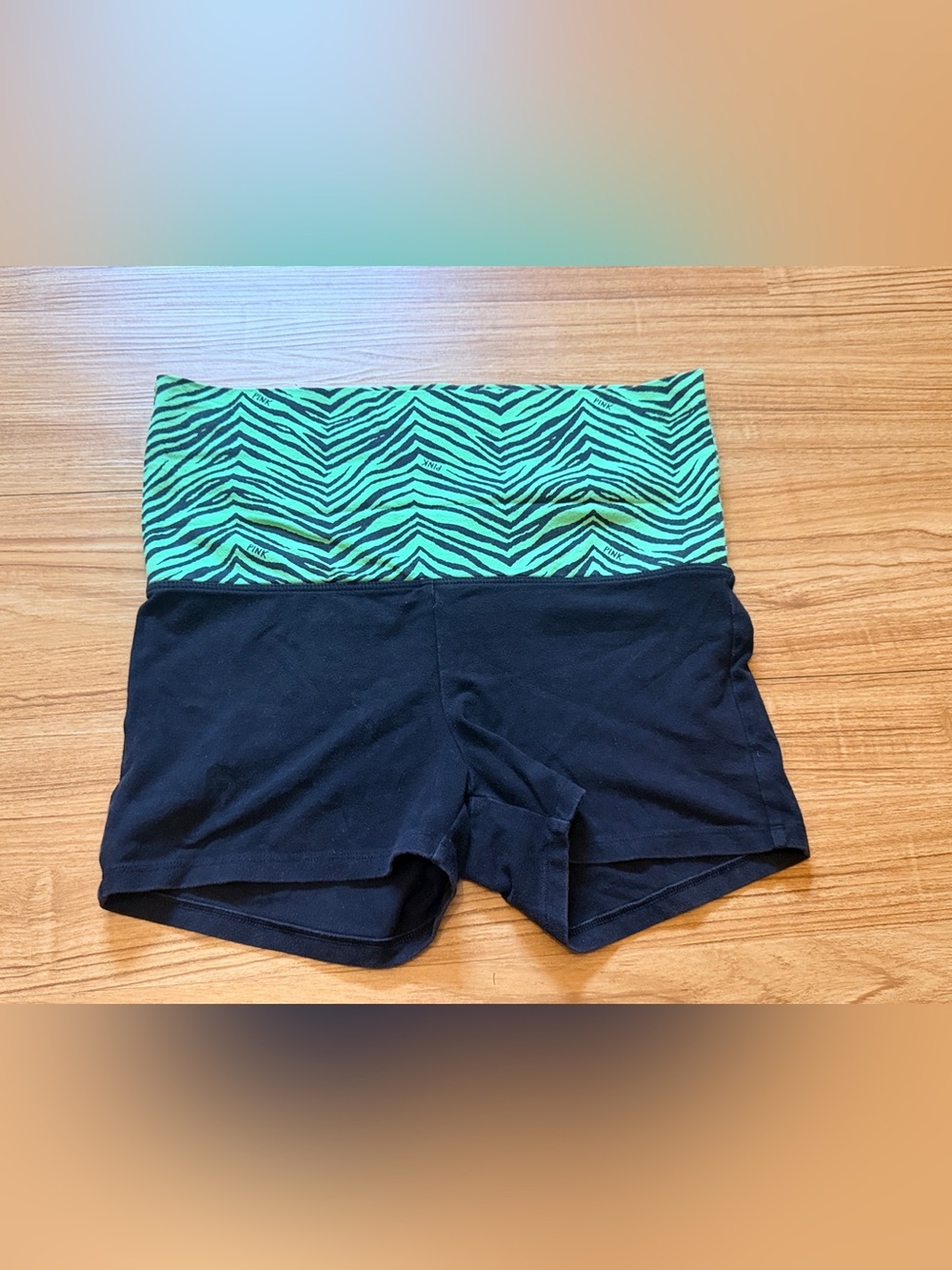 PINK Victoria's Secret roll-down Black Shorts with Green Zebra Waistband